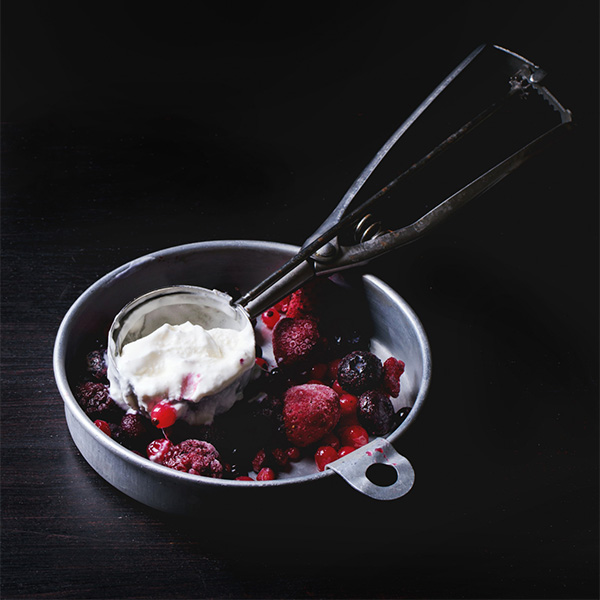 vanilla icecream served with fruit coulis